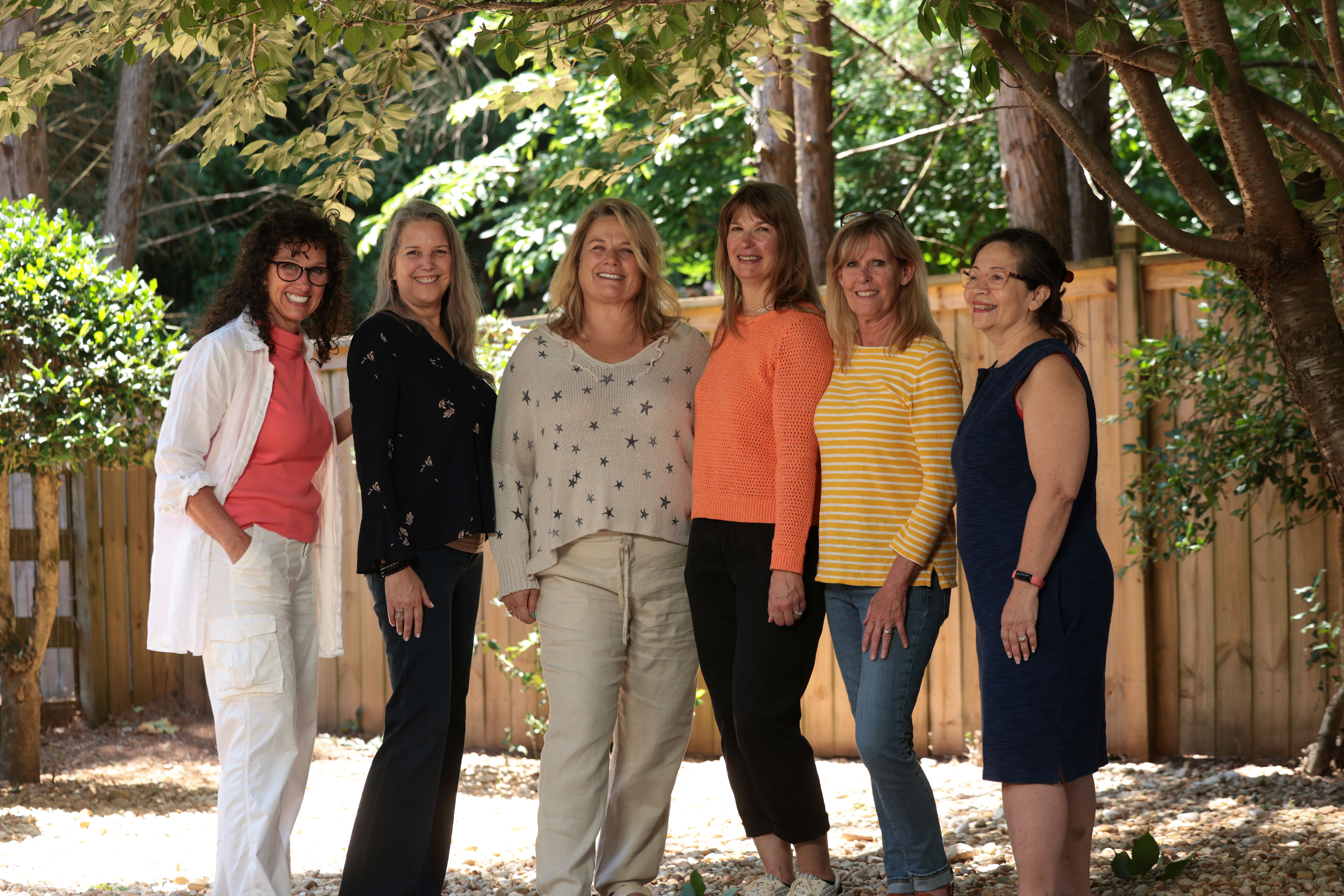 The Warrior Bride Ministries volunteer team gathered together from the team photoshoot